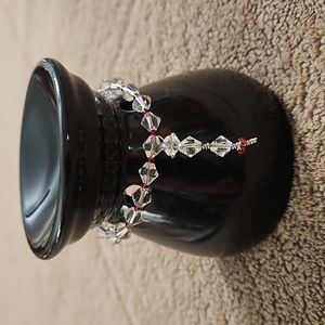 Tea light powered oil warmer